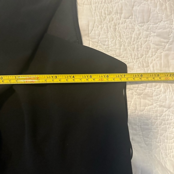 Express Black stretch jumpsuit. Low v neck front & opening below breast line. - Picture 9 of 9